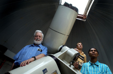 A picture of Harry Gelman with students